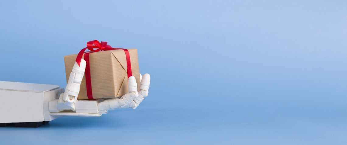 Gift box in automated robot hand, blue background