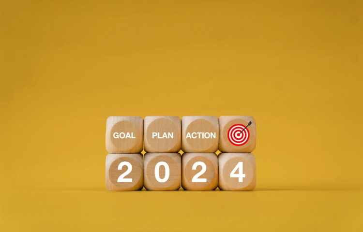 Growth goals in 2024 goal, plan, action. Success goal concept. Wooden block with the numbers 2024