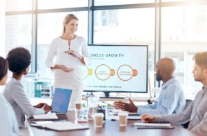 Corporate woman, workshop or seminar for presentation for business growth, development or team disc