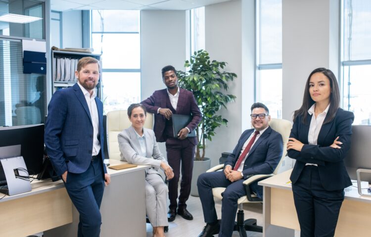 Large group of young successful intercultural office workers