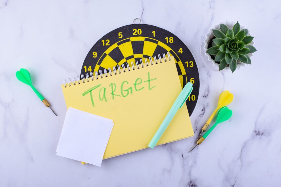Target and goal concept with darts and arrows