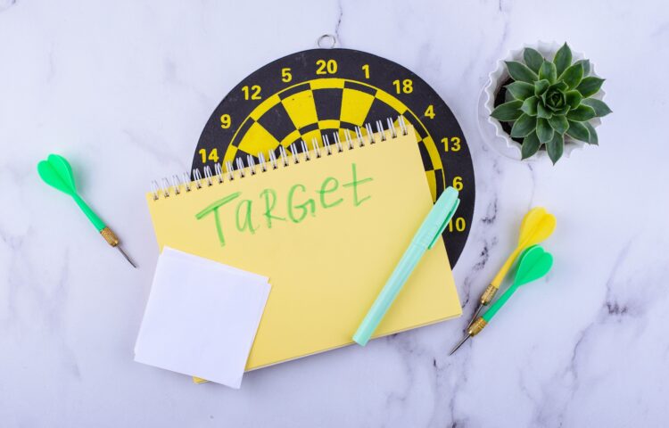 Target and goal concept with darts and arrows