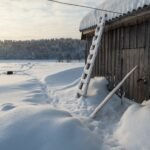 Wonderful winter rural landscape. Old wooden barn