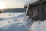 Wonderful winter rural landscape. Old wooden barn